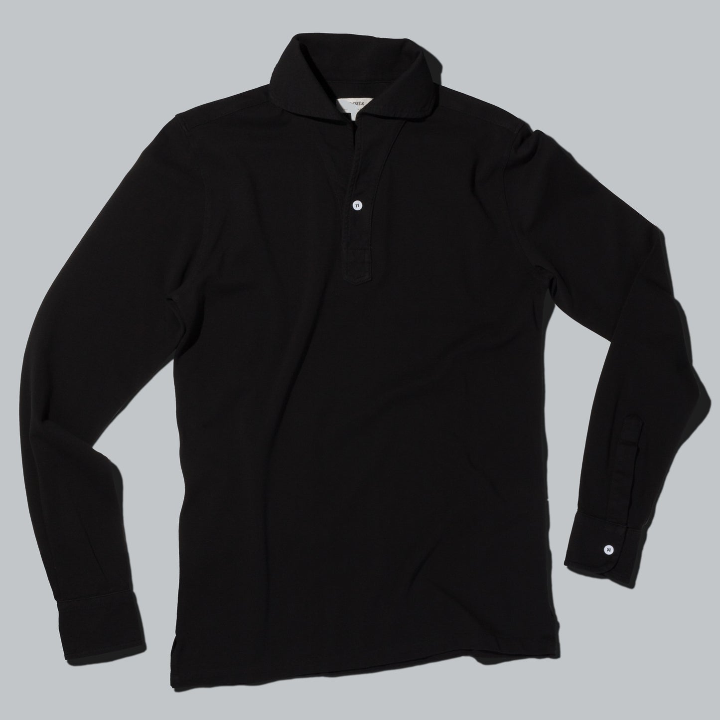 Polo Manga Larga · Negro (RESERVA)