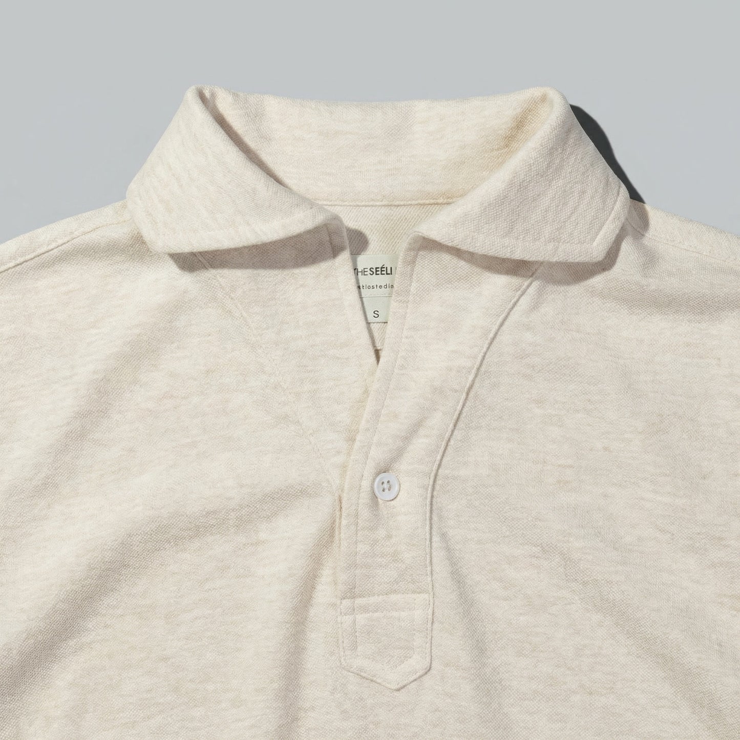 Polo Manga Larga · Crudo Mélange (RESERVA)