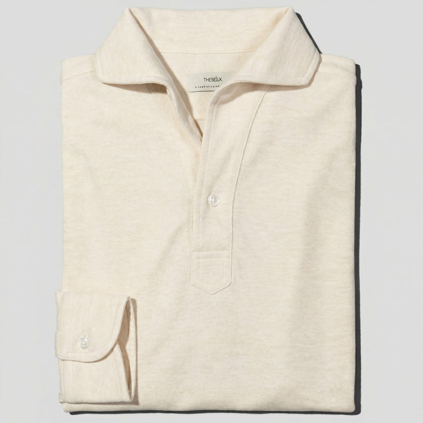 Polo Manga Larga · Crudo Mélange (RESERVA)